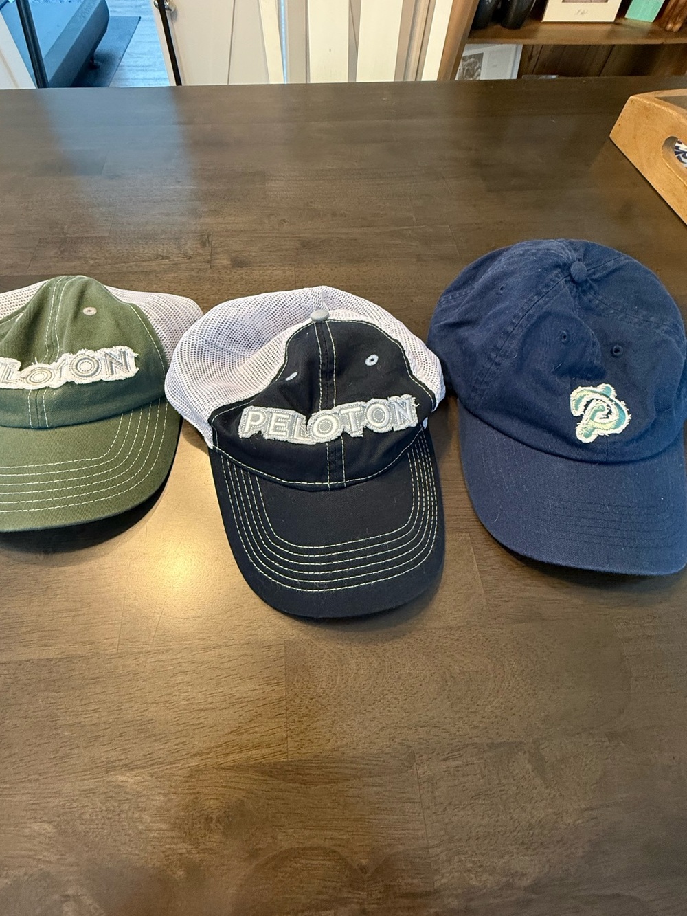 Peloton Trio Caps in Green, Black, Navy